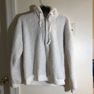 white fluffy sweater